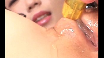 Dripping wet Asian peachy cunt toyed with vibrator in close-up