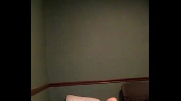 Young Girl Recording Masturbates on Bed While Talking on the Phone